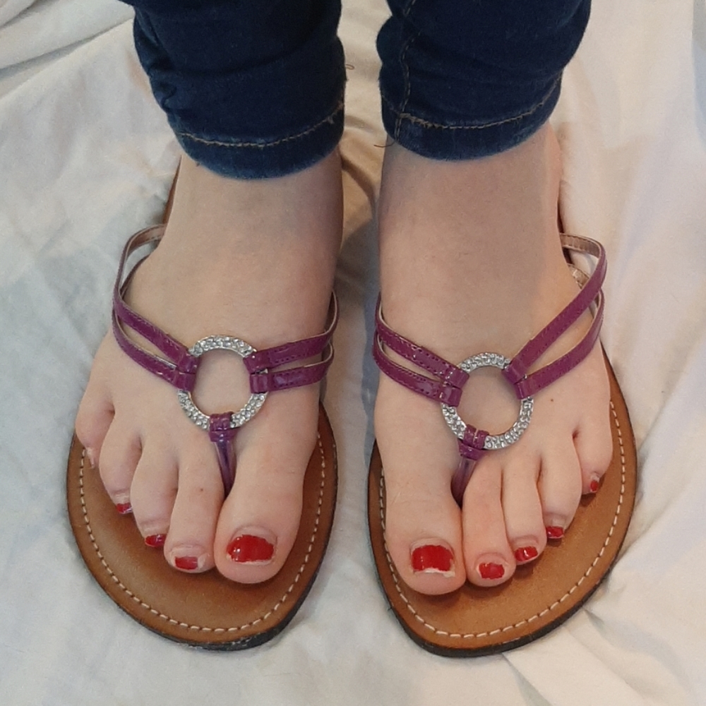 Pink and brown flip flops